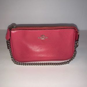 Coach pink zip top wristlet